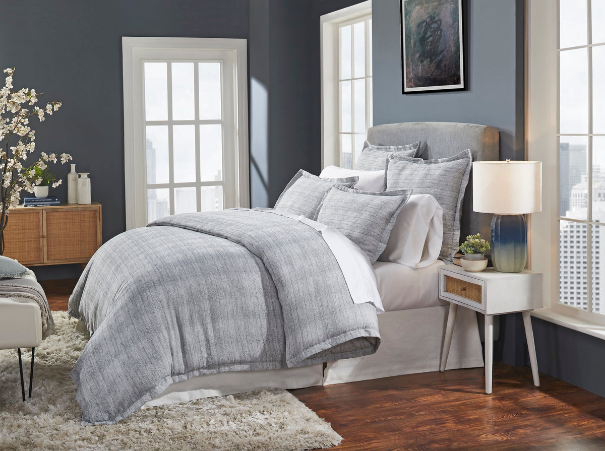 DT-035-9092_2|Inviting gray textured duvet cover set and matching shams, creating a cozy and stylish contemporary bedroom scene.