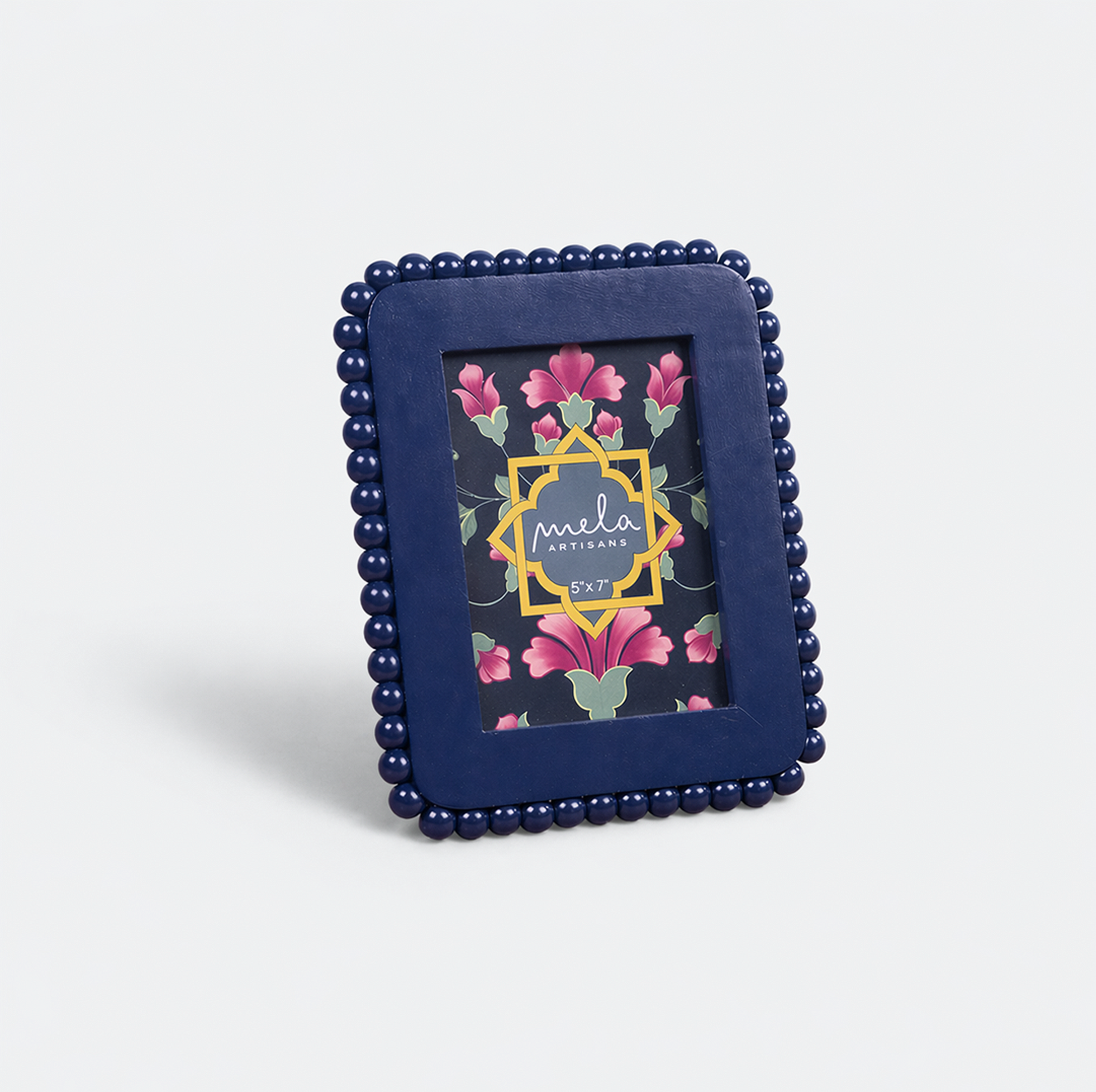  Close-up of handcrafted beaded detailing on photo frame from Raatriti collection