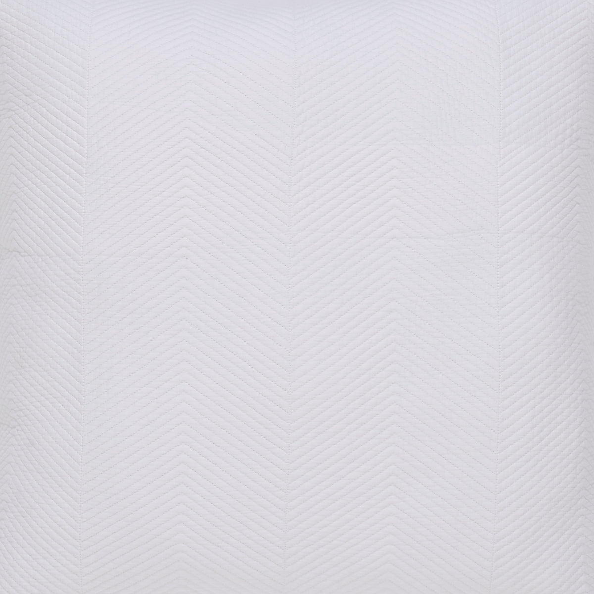 CL-170-9496_10|Close-up of premium white coverlet fabric, showcasing its intricate chevron textured pattern. Modern and luxurious bedding.