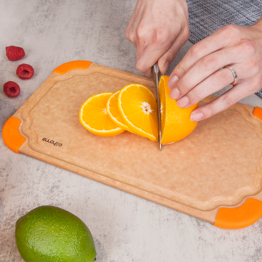 Slicing fresh oranges on Elihome Premium Series Small Cutting Board