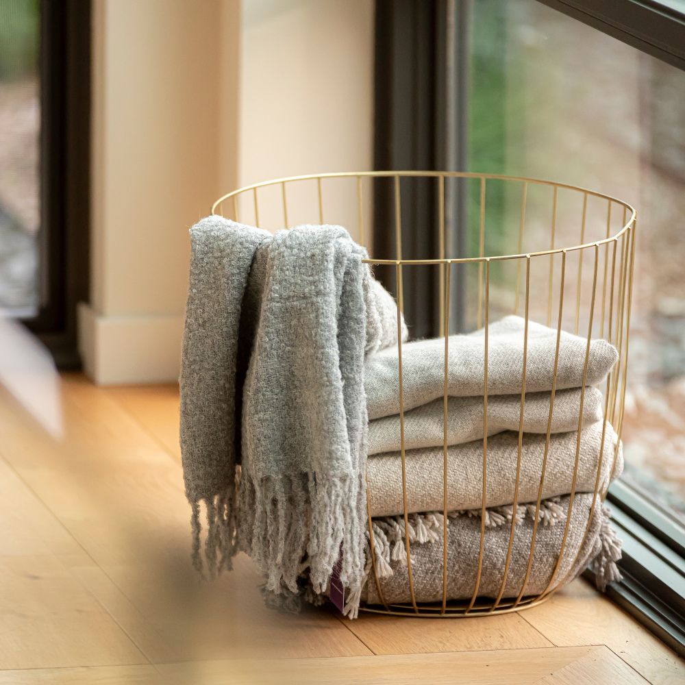 Grey handwoven throw stacked