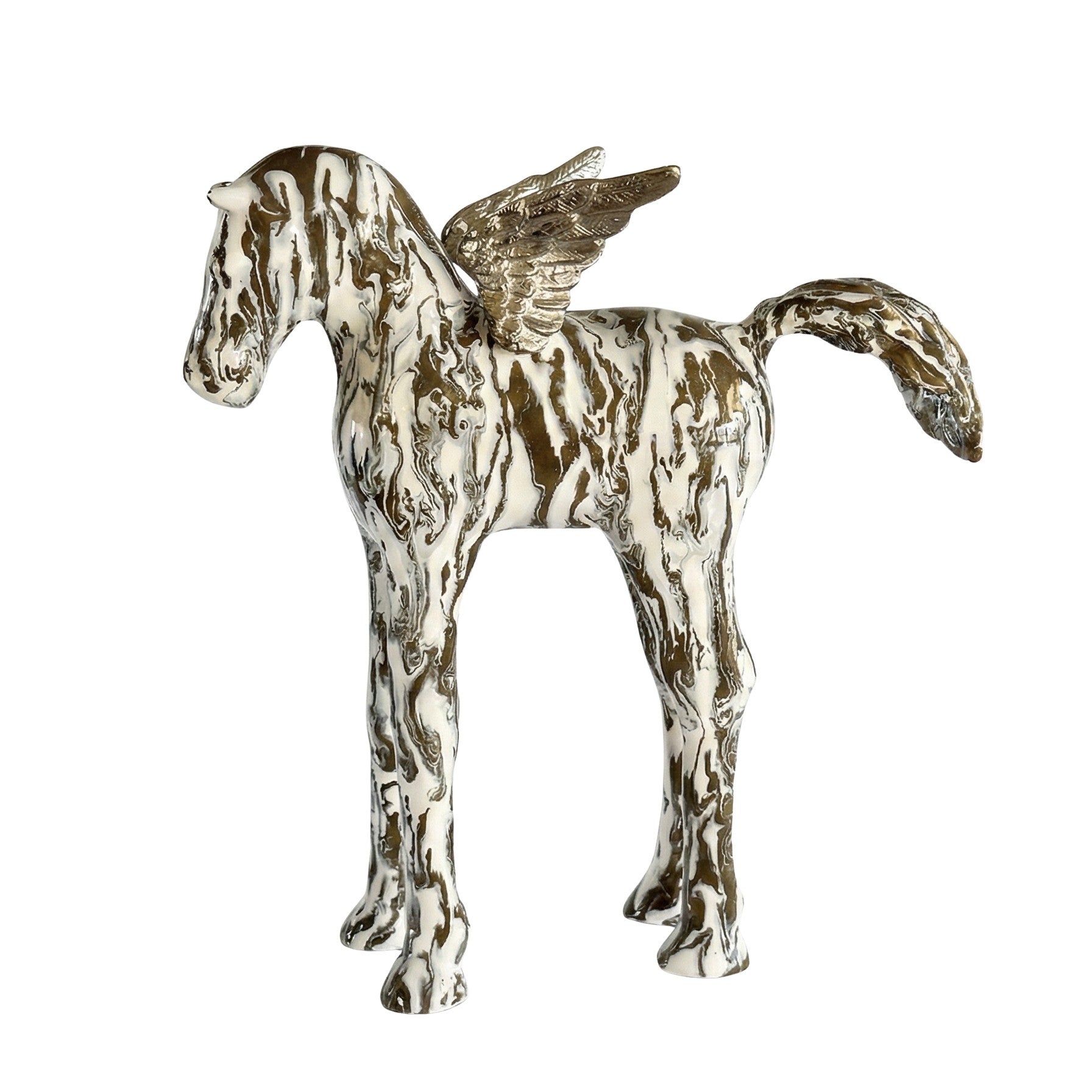 Metallic winged horse figurine on a dark pedestal with a blurred natural background