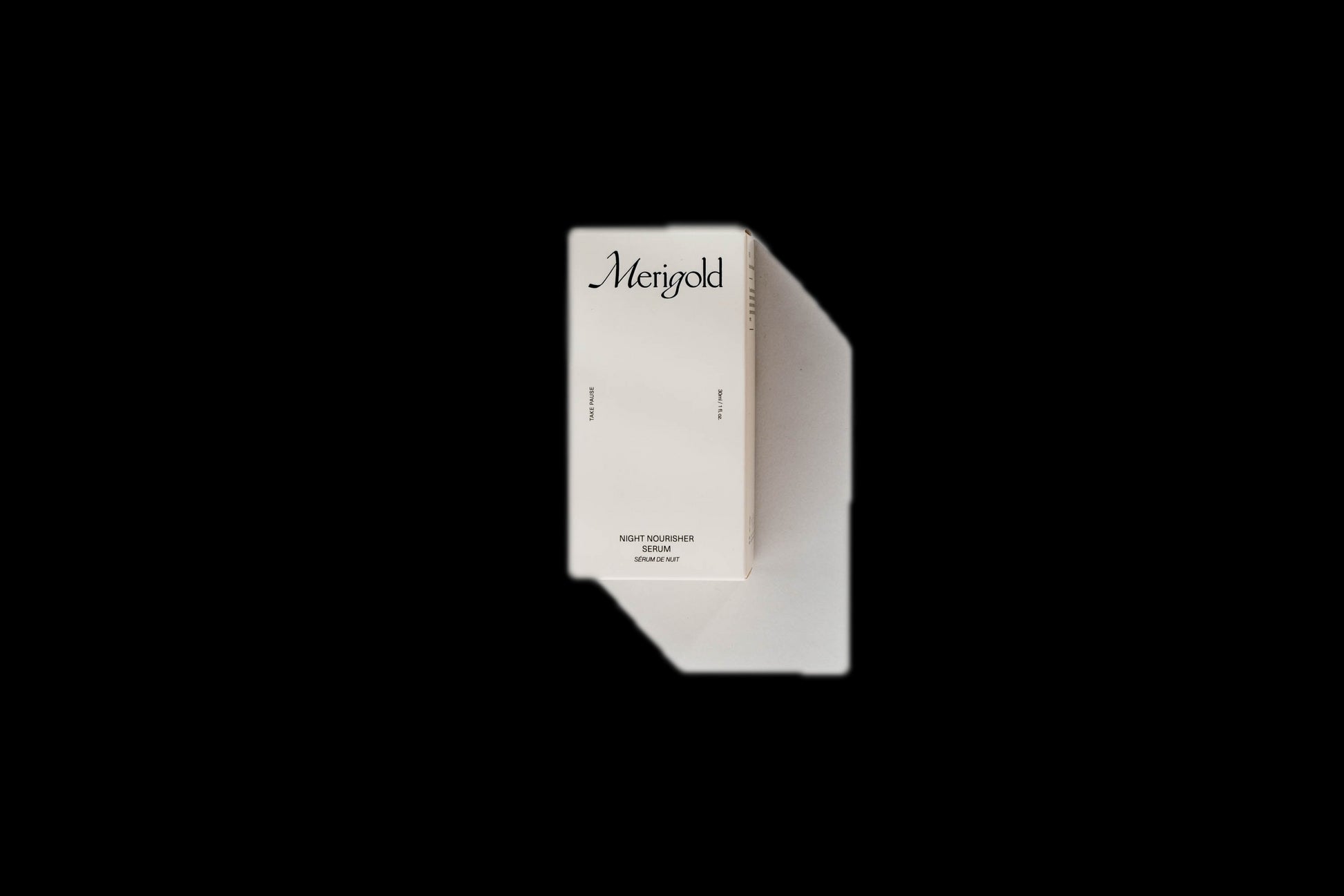 Merigold Night Nourisher Serum minimalist cream box on white background — luxury natural night serum for glowing skin