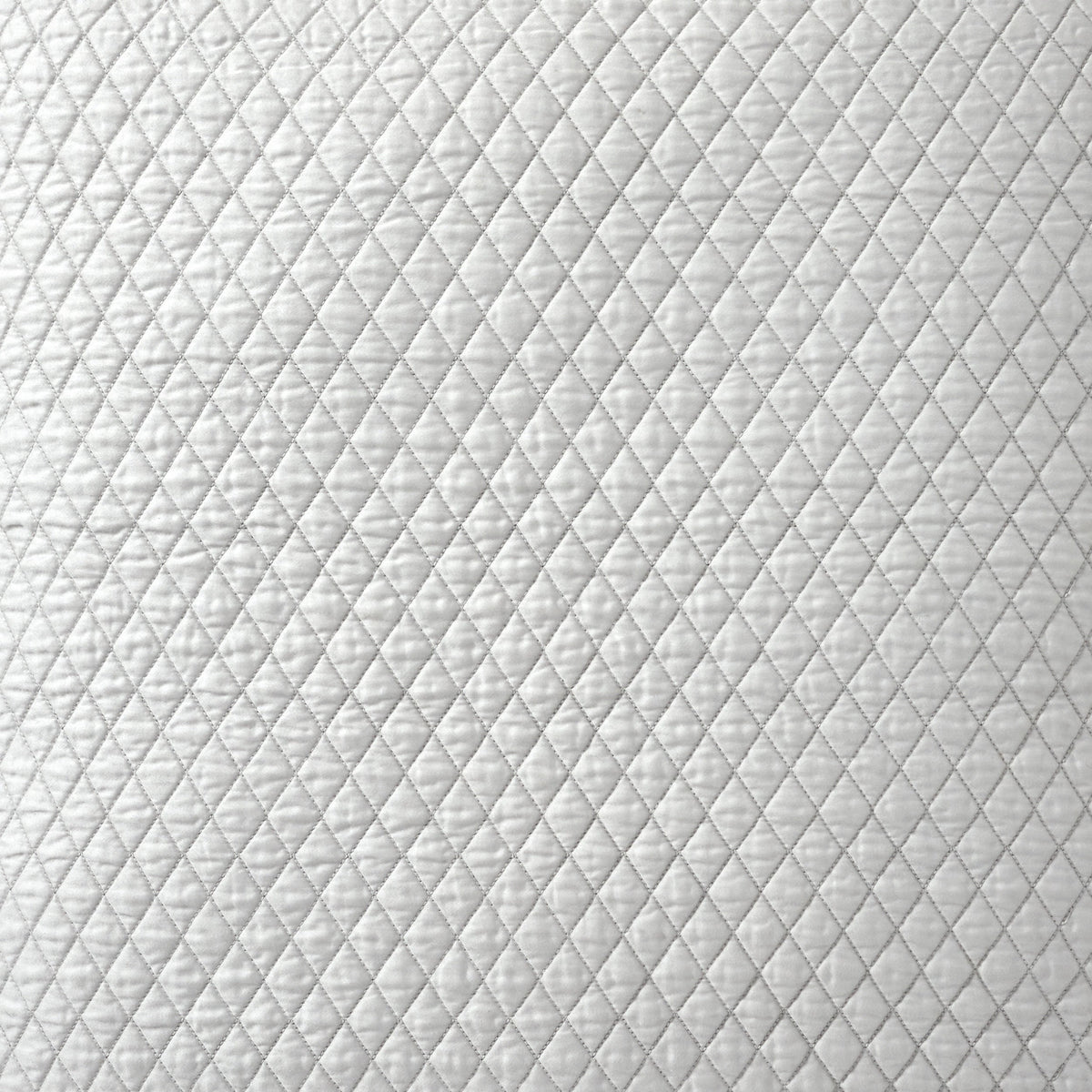 CL-266-11096_9|White quilted coverlet texture with precise diamond stitching, soft and luxurious bedding for a modern bedroom aesthetic.