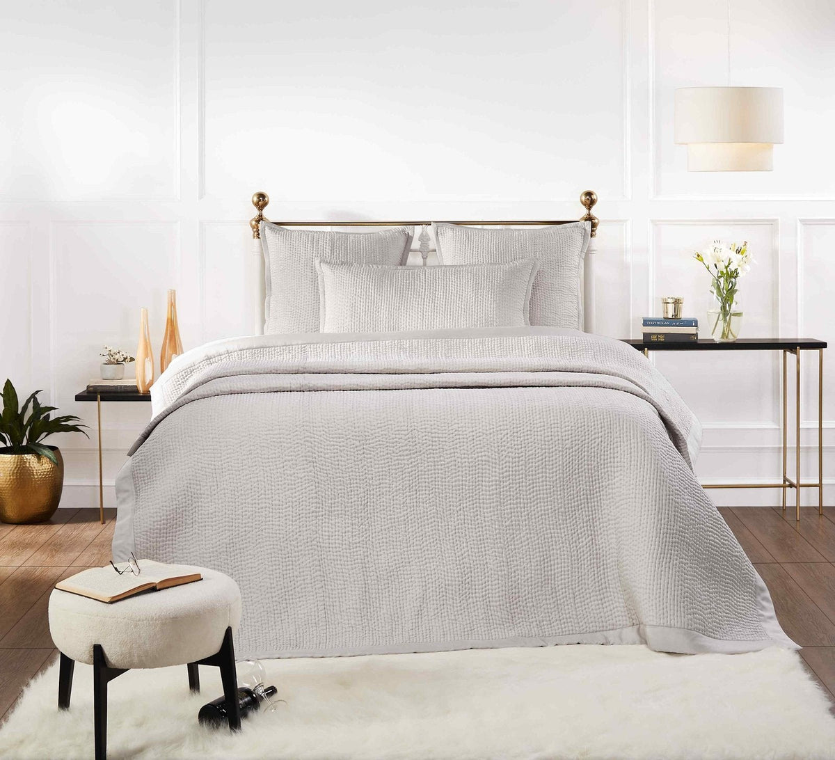 CL-166-11096_3|Light grey quilted coverlet featuring a small, irregular waffle-like quilting pattern and clean finish. Bed setting.