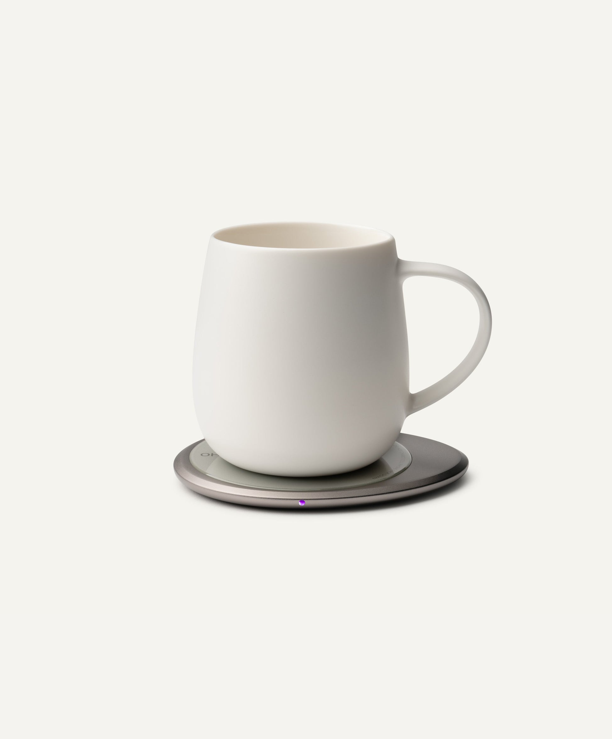 Ui 3 Self-Heating Ceramic Mug 12 fl oz / 355 mL in Jasmine White on Ohom Charging Pad 3
