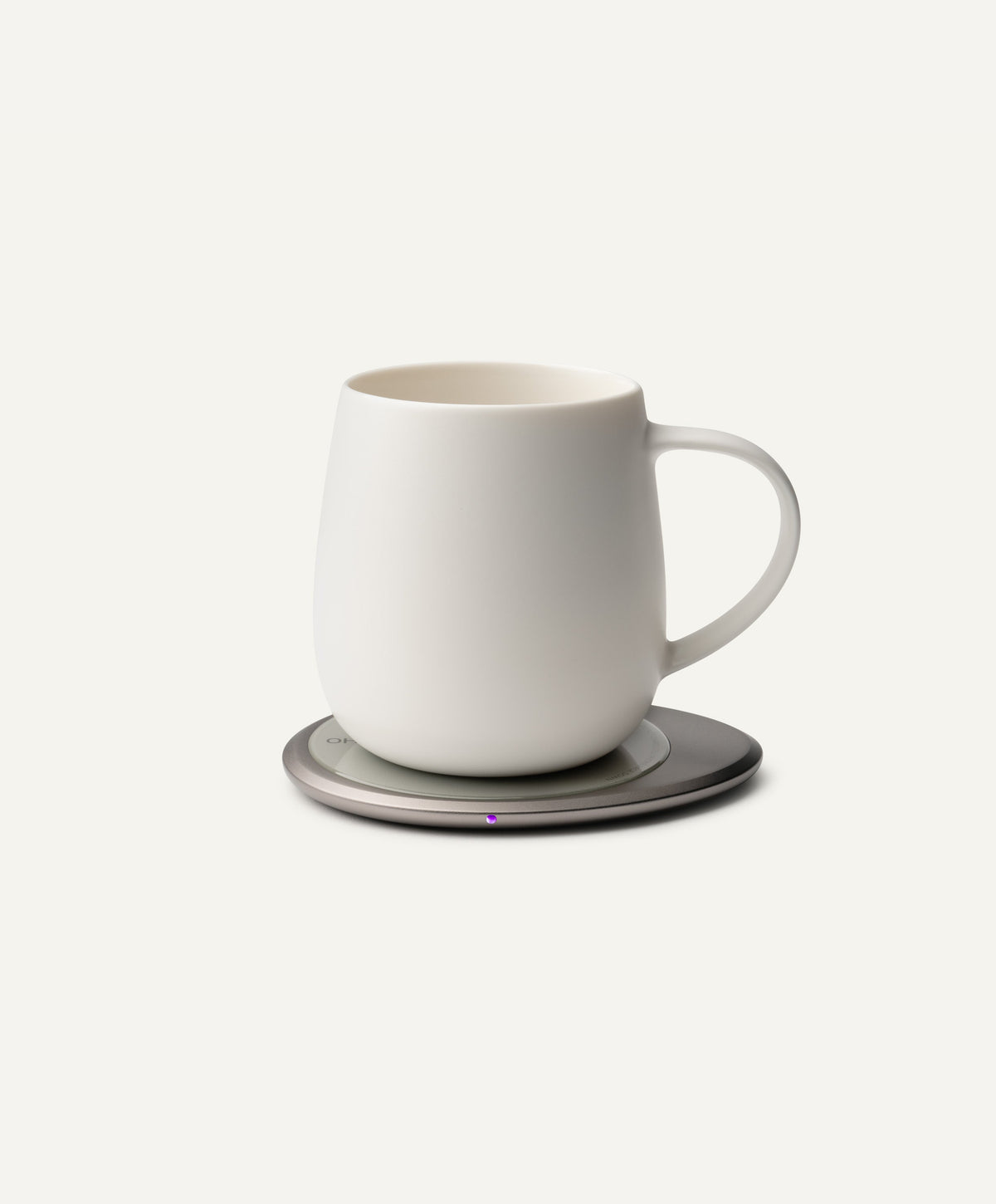 Ui 3 Self-Heating Ceramic Mug 12 fl oz / 355 mL in Jasmine White on Ohom Charging Pad 3