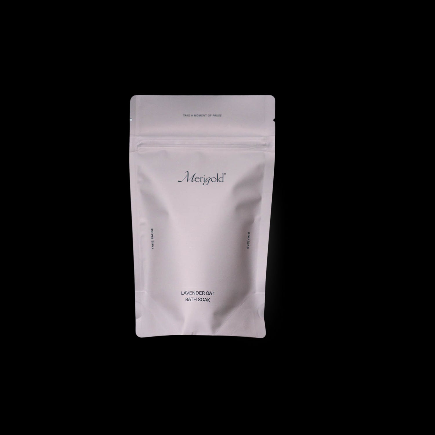 Merigold Lavender Oat Bath Soak is in a lavender resealable bag with a minimalist design, highlighting ingredients like organic oats, lavender flowers, and Epsom salt. Photographed on white background.
