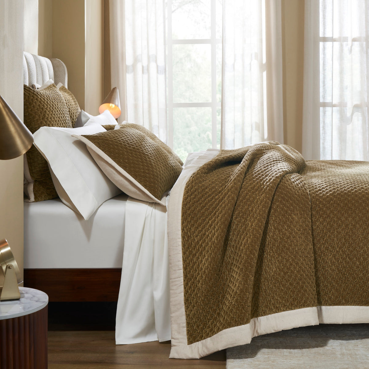QT-378-11096_4|Close-up of luxurious golden-brown quilted bedspread with matching shams, textured design, and cream trim.