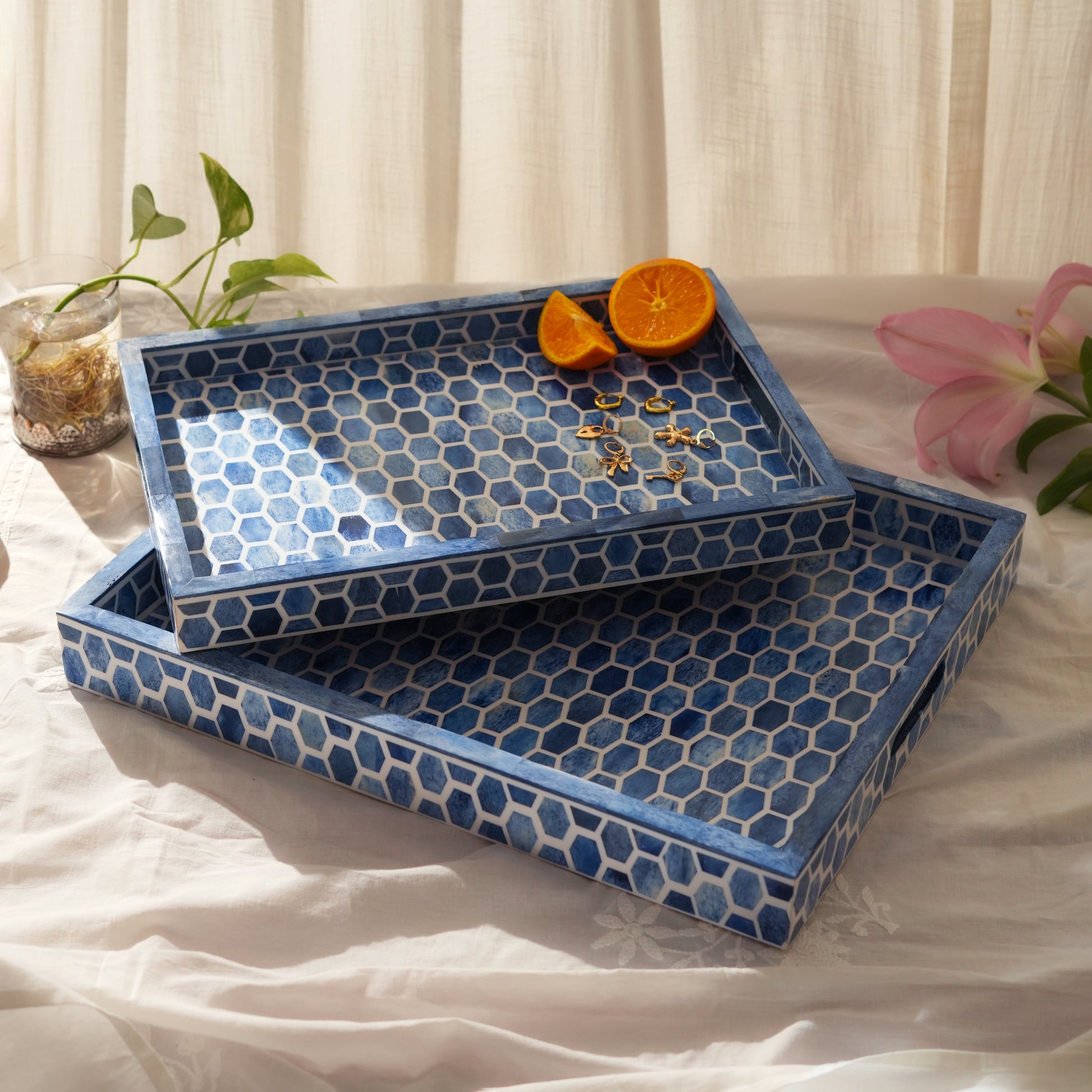 Luxe indigo bone inlay tray with a rhythmic honeycomb motif and polished artisanal finish.