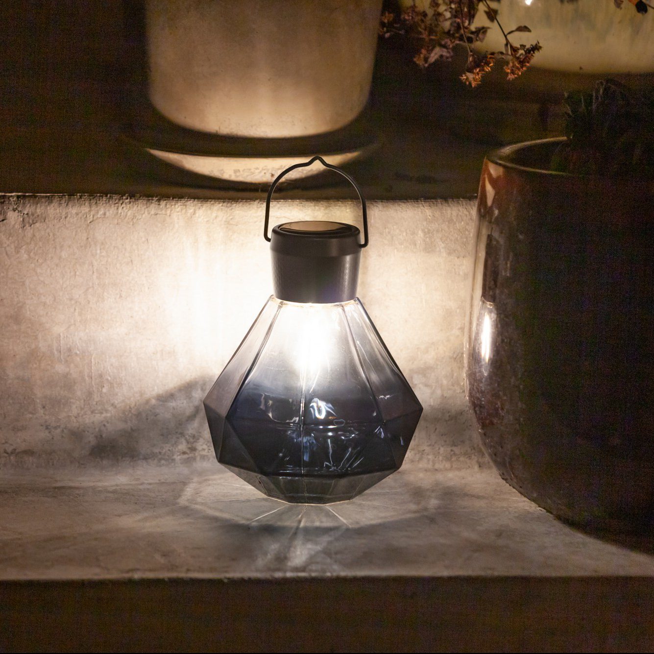 Gem Light Solar Lantern lit up on stairs