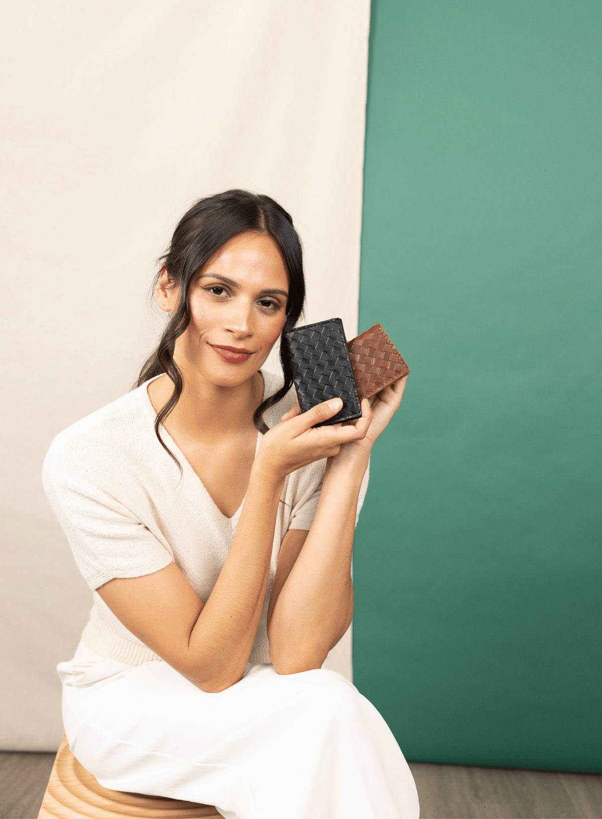 modern woven wallet in black interior view from fall collection.