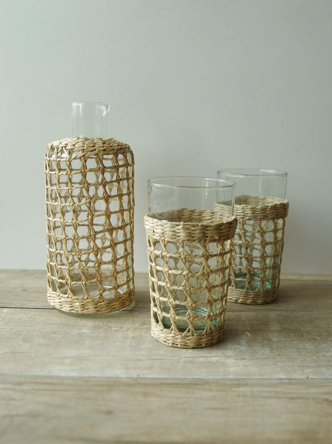 Seagrass Large Cage Carafe Glass Seagrass Brand_Seagrass & Rattan Carafes Kitchen_Drinkware Serving Pieces SeagrassWrapCarafeandHighballGlasses_1124x1500_8525f92d-0302-4f8c-8db2-712417c17c48