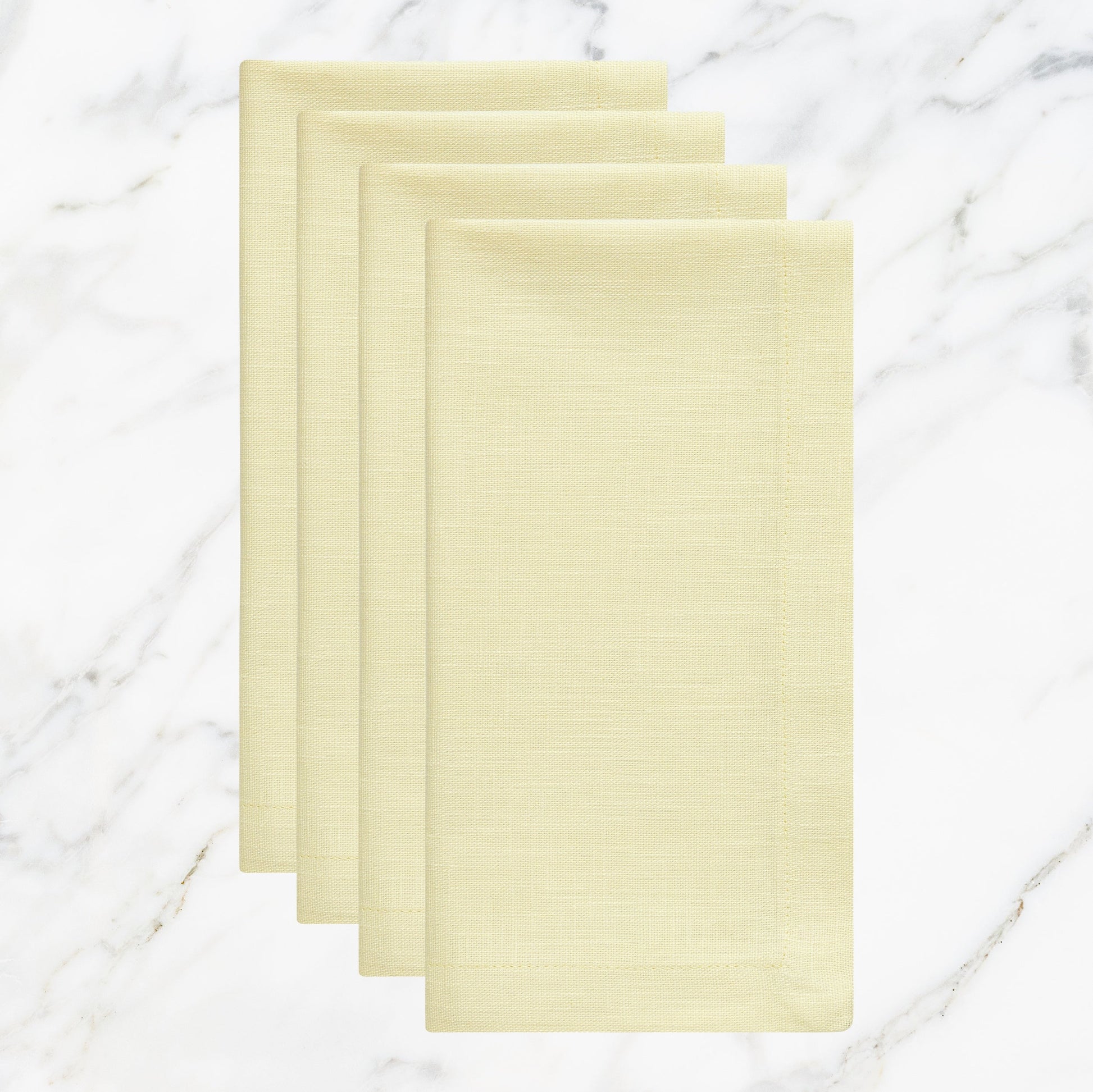 NP-4807-2020_1|Set of 4 light yellow linen-blend cloth dinner napkins for elegant table settings. Reusable and stylish dining.