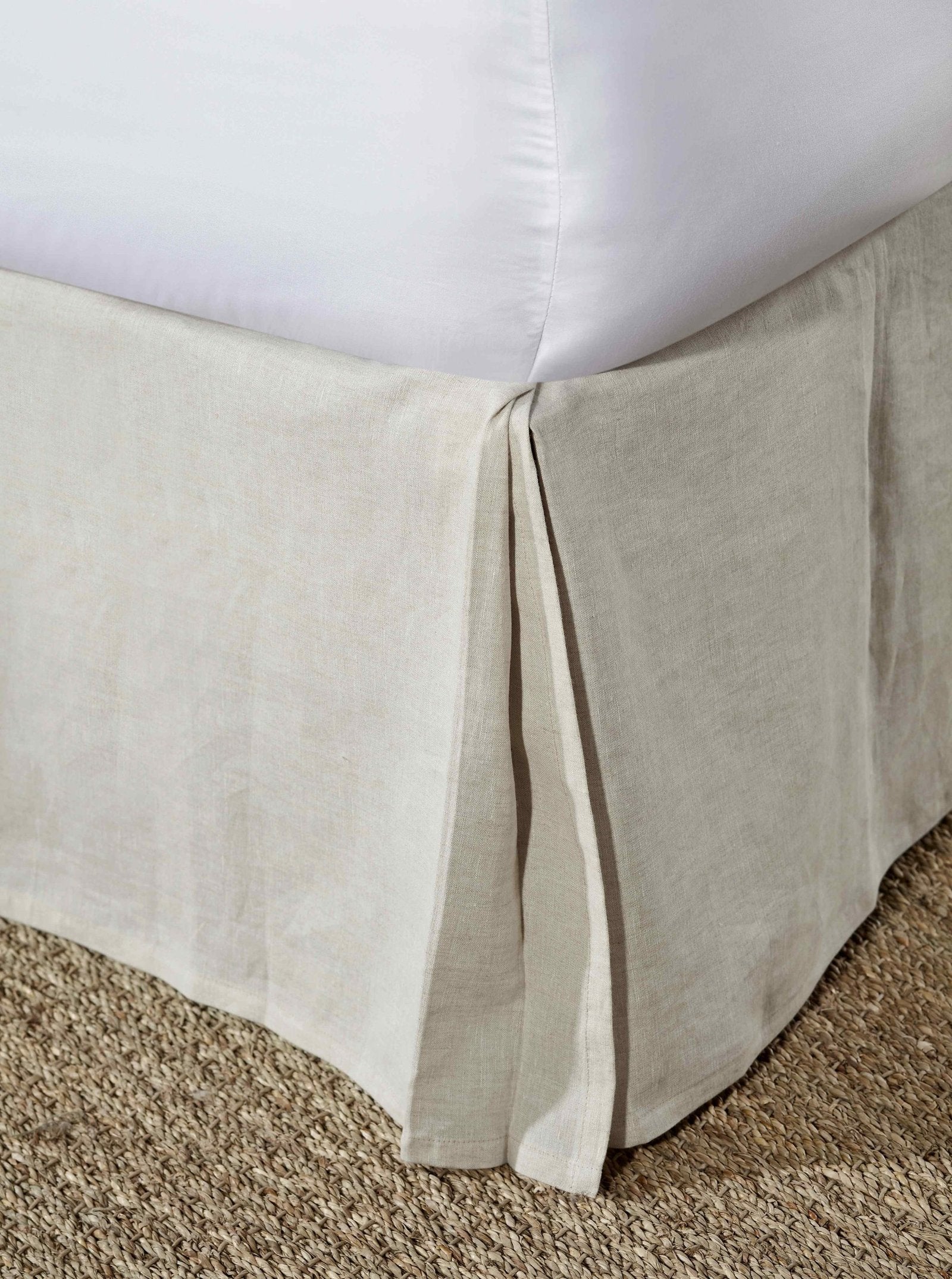 BS-102-6080_1|Close-up of a stylish pleated beige linen-blend bed skirt, adding a clean, finished look and elevating bedroom decor.