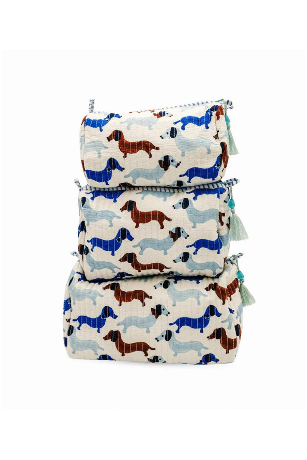 Stacked dashing doxies toiletry bags with colorful dachshund patterns, tassels, zipper detail