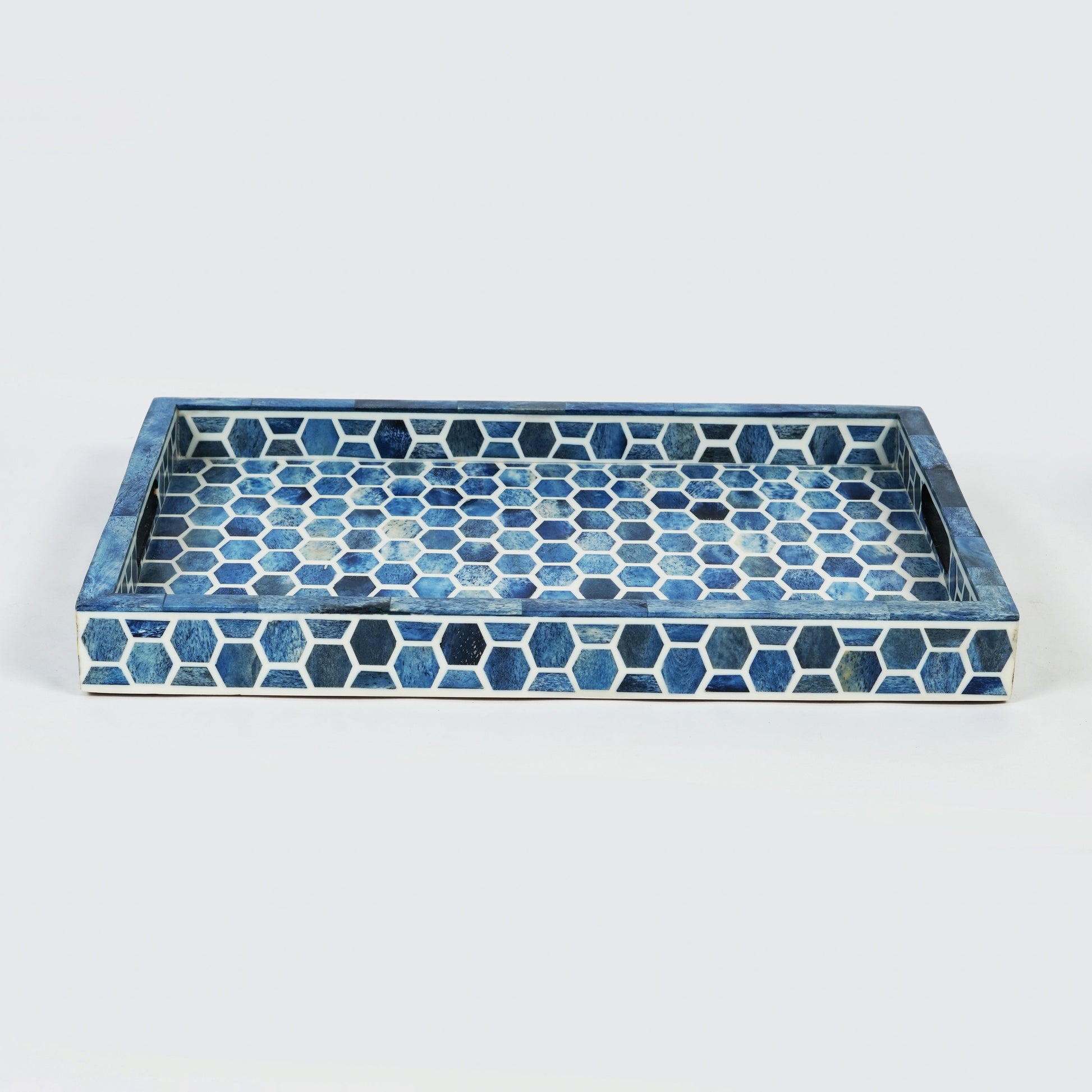 Striking blue and white bone inlay tray, a perfect statement piece for global-inspired interiors.