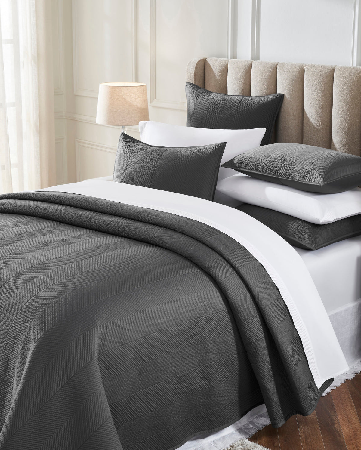 CL-263-11096_3|Detailed view of a charcoal grey quilted coverlet set, showcasing its elegant herringbone pattern and luxurious texture.
