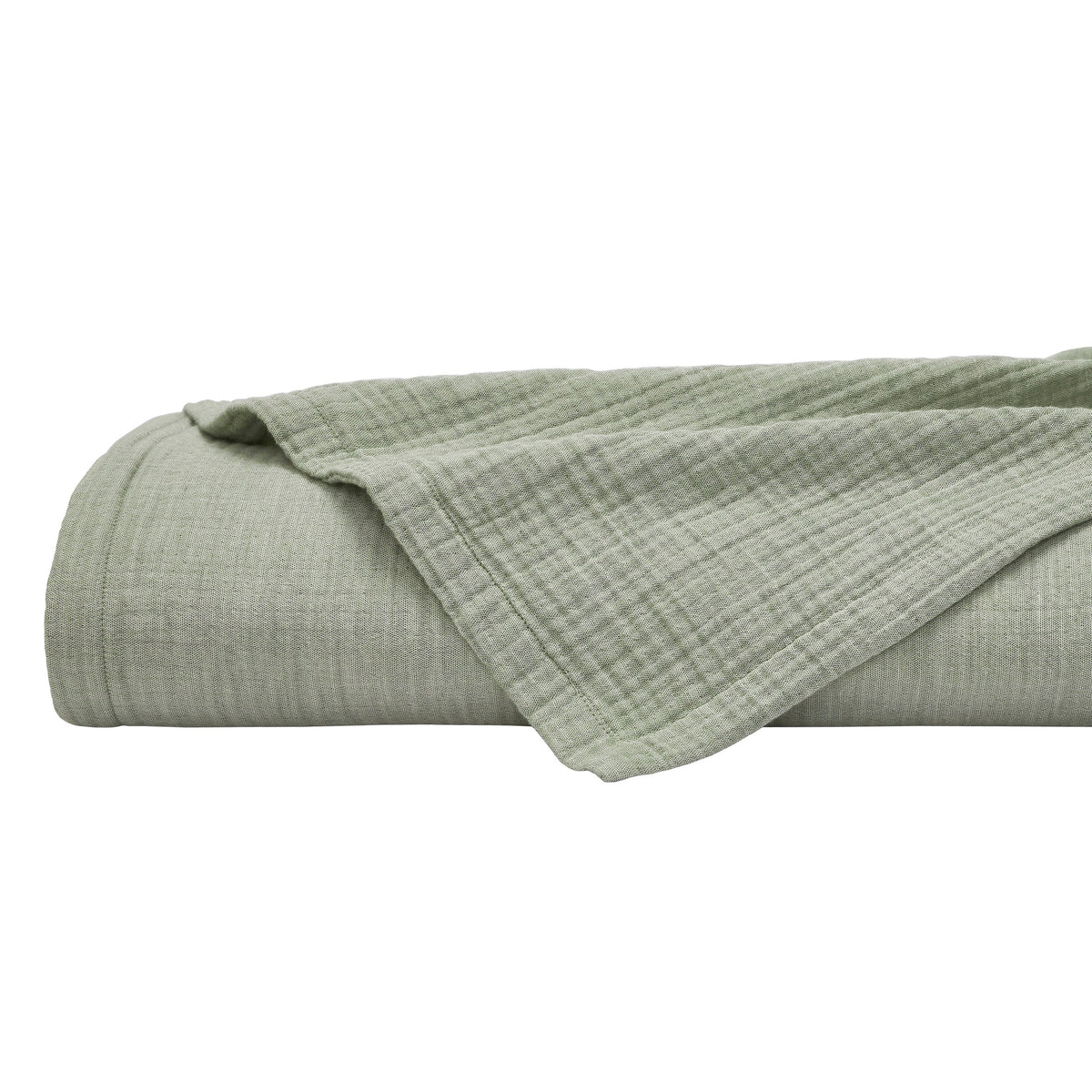 BL-864-9496_6|Neatly rolled sage green textured blanket, showcasing its plushness and cozy fabric, perfect for bedroom comfort and style.