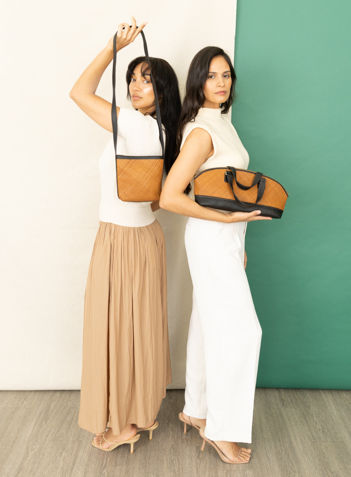 panye crossbody bag and satchel bowler bag from our spring collection held by models.