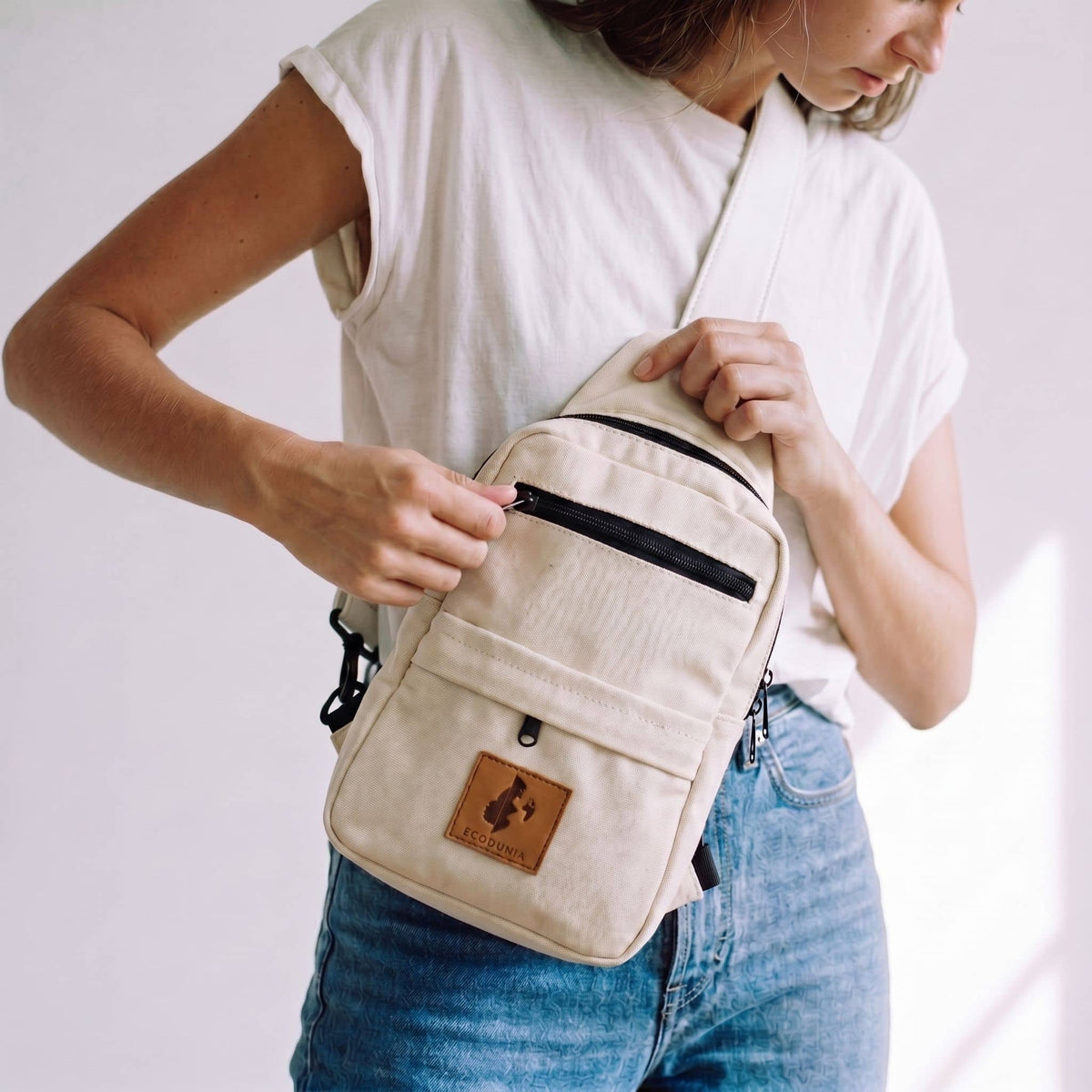 Umoja cream vegan leather men crossbody sling bag #color_cream