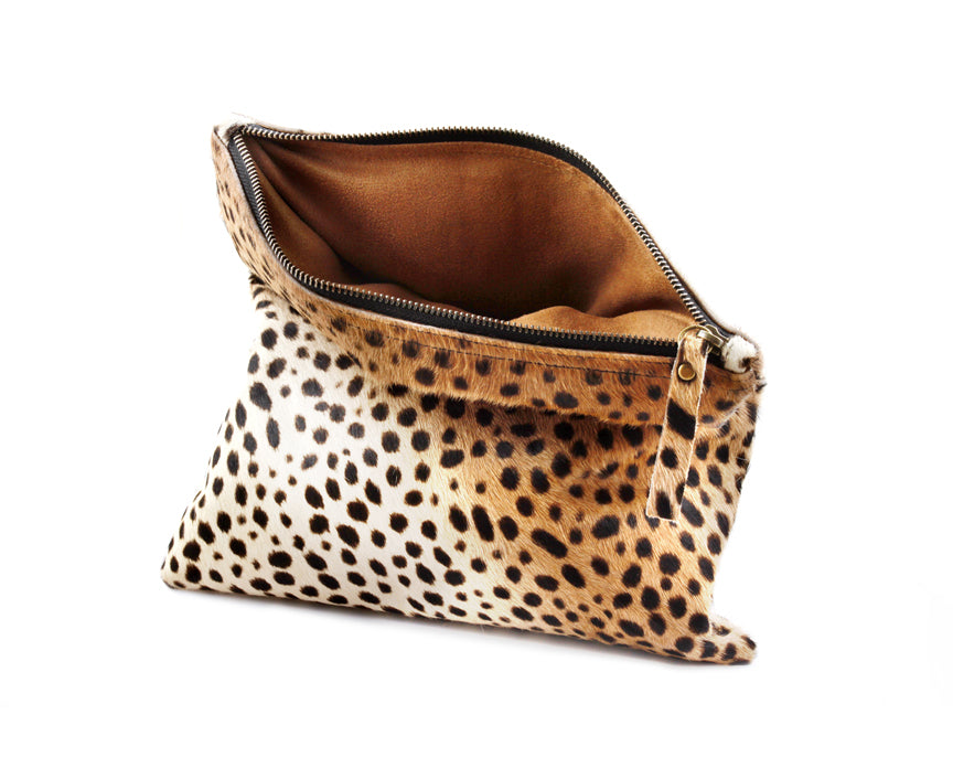 Inside view leopard print foldover clutch