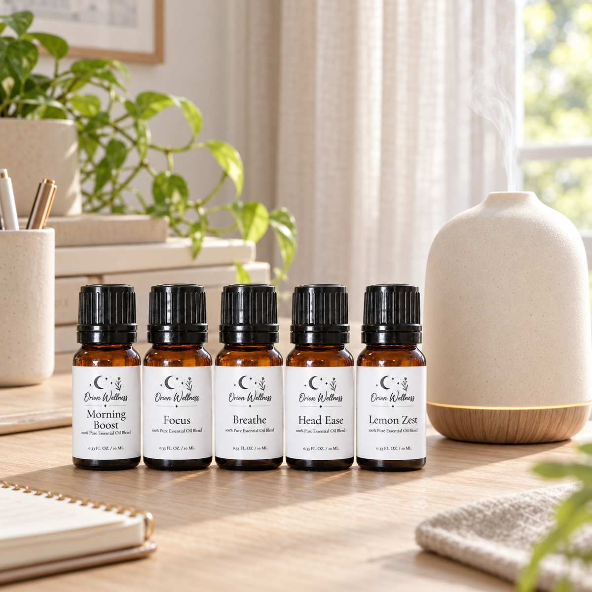 Orion Wellness daytime diffuser blend set beside a running diffuser
