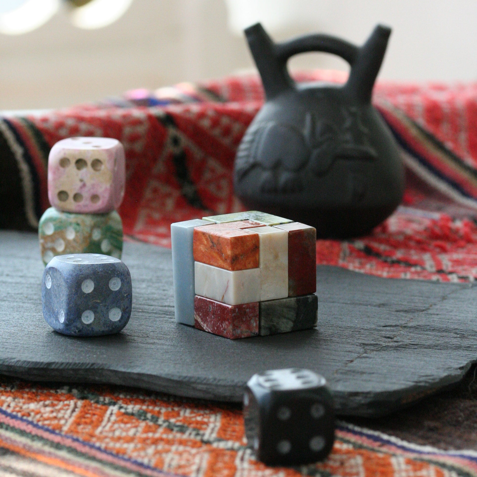 Decorative gemstone Soma cube serving as an understated luxury object in a contemporary room.