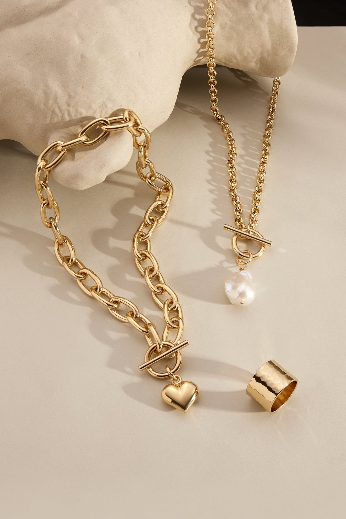 Gold-toned Alana Puffy Heart Charm Necklace jewelry set for stylish looks