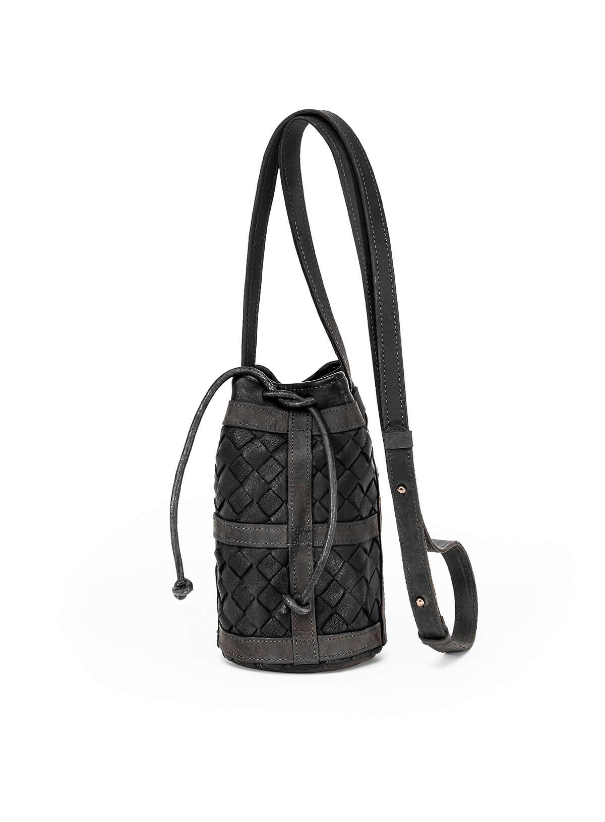 Mini essential bucket bag held by model who is holding womens handbag in black. 