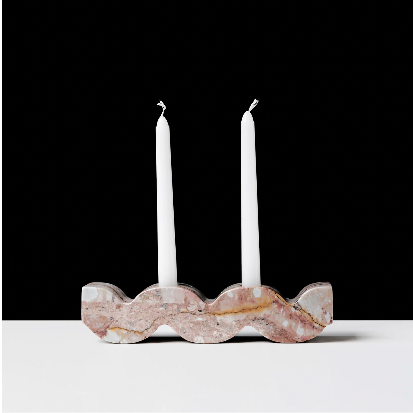 Wavy gemstone candelabra - Creamy Soapstone. The Wavy candelabra brings a playful energy to the table, with a reversible shape that holds either 2 or 3 candles. 
