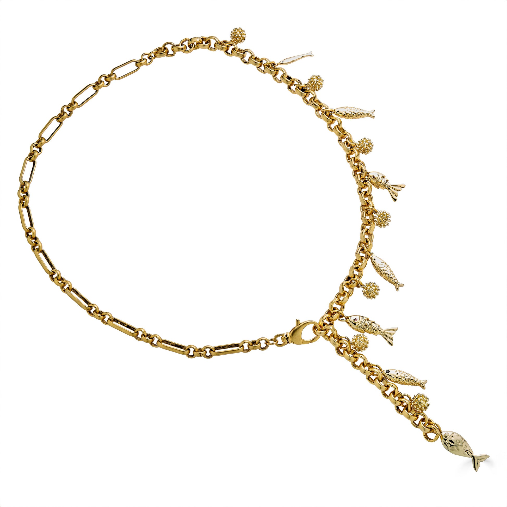 Convertible gold fish charm necklace with dangling fish and textured bead charms worn as both a lariat and classic chain necklace.