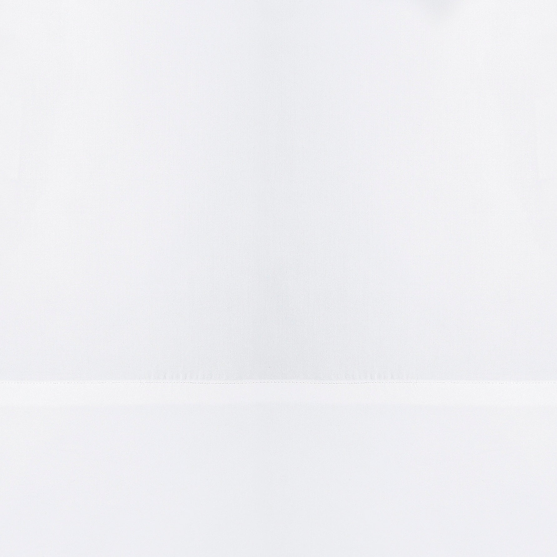 QSS-547-6080_6|Detailed close-up of smooth, pure white 100% cotton flat sheet, showcasing its soft texture and fine weave.