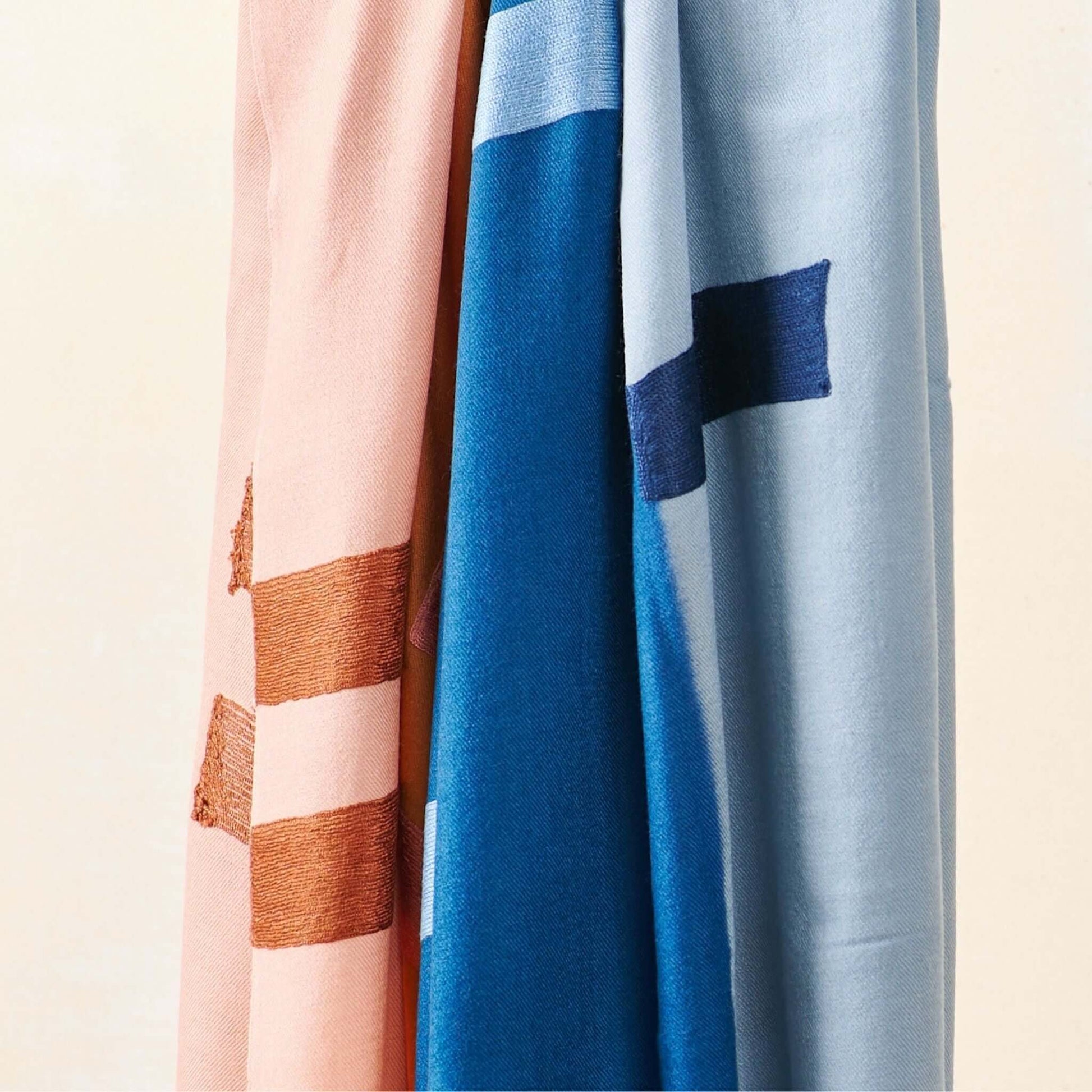 Canyon Hand Embroidered Hand Woven Merino Silk Soft Scarf in soft colors and intricate embroidery hanging elegantly.
