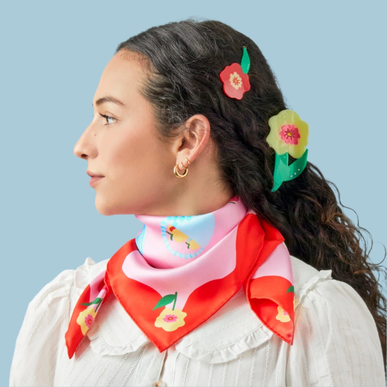 Yellow flower hair claw with green from Centinelle