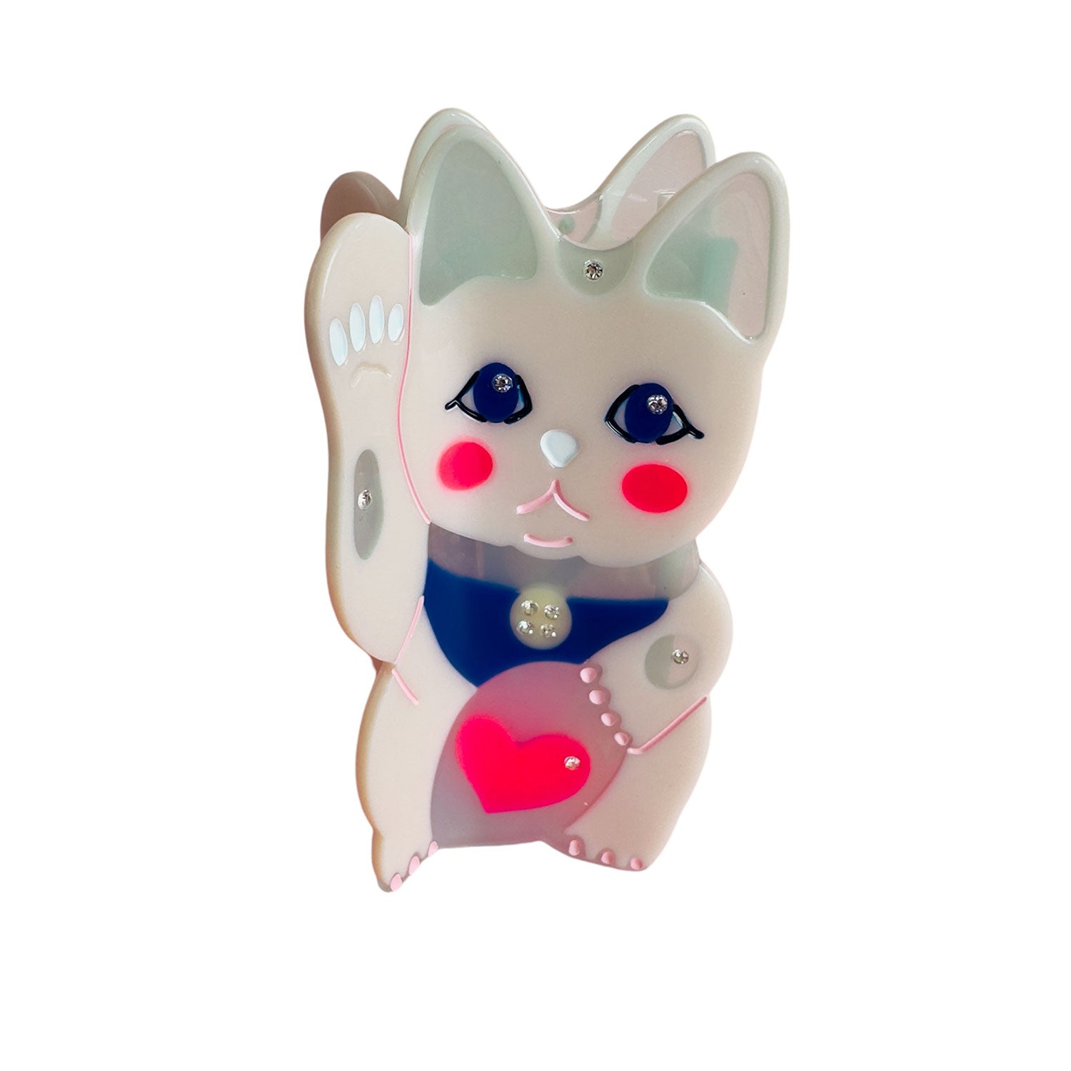 A maneki-neko white cat hair claw with a pink heart from Centinelle. Handmade on cellulose acetate, with splice technique, exquisite miniature details and crystals, that are tied directly to its value and make them unique and special. 