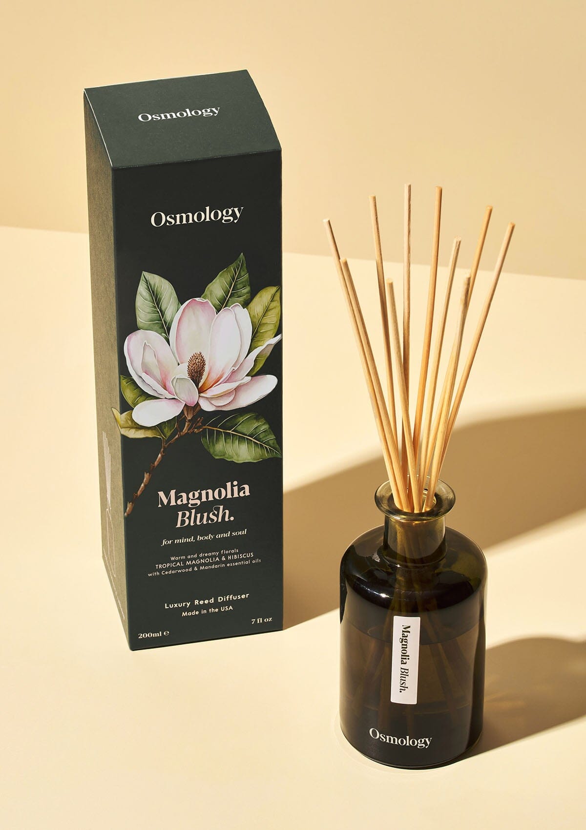 Magnolia Blush diffuser by Aery displayed next to product packaging on white background 