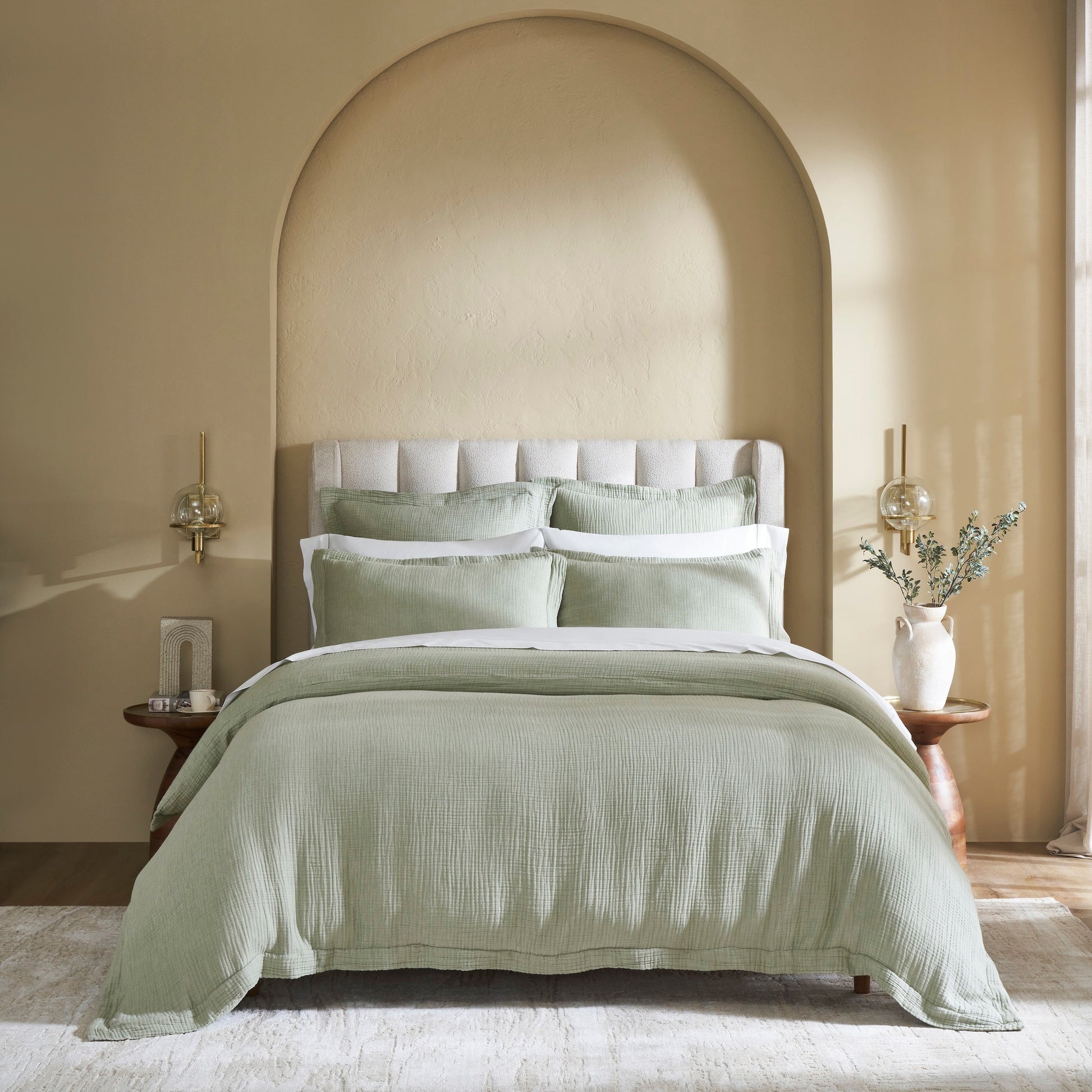 DT-051-9092_1|Stylish light green textured muslin duvet cover set on a bed in a modern, serene bedroom with an arched headboard niche.