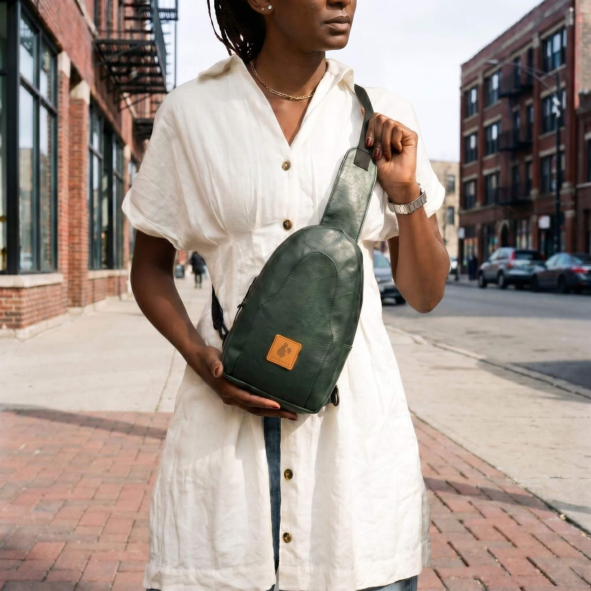 Buru forest green vegan leather sling bag crossbody wear #color_forest-green