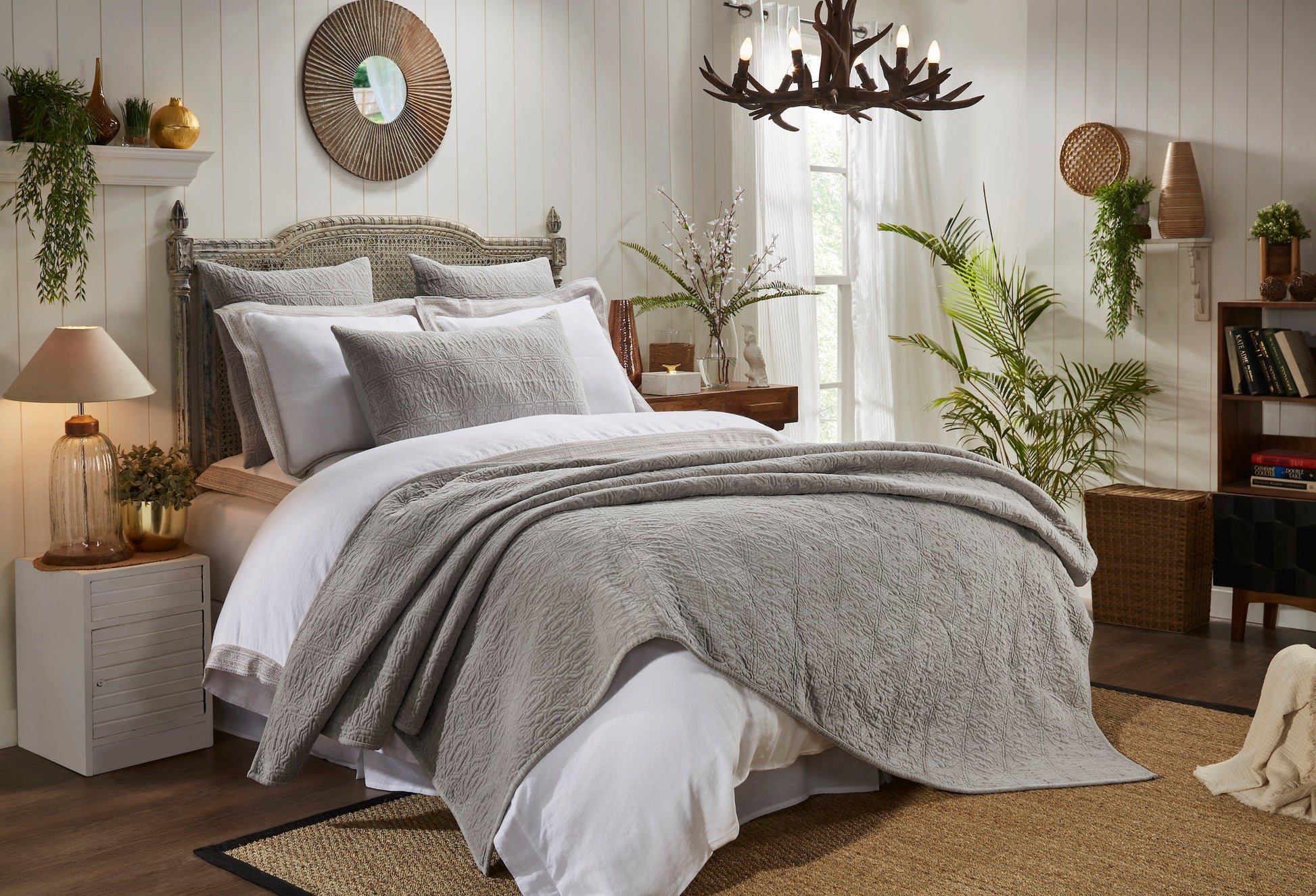 QT-331-9496-LOT1_2|Inviting light grey quilt with an intricate geometric quilted pattern, providing comfort and style to a bedroom.
