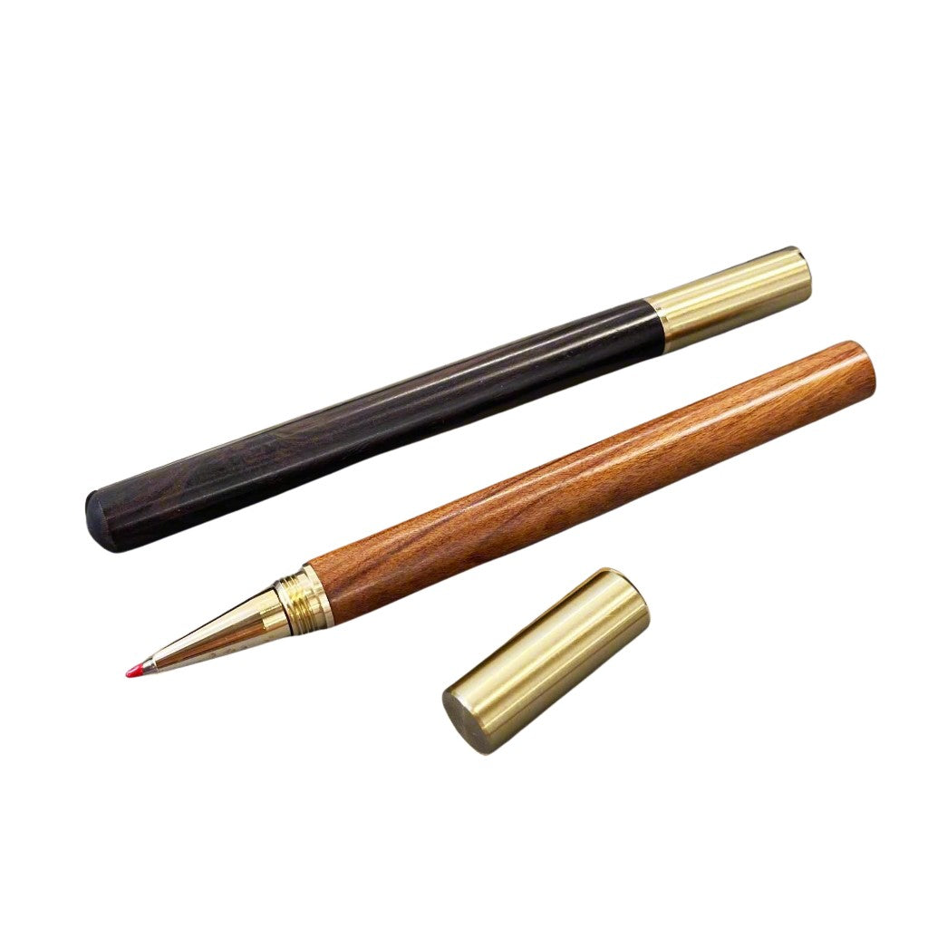 Handcrafted wood pen in oak and ebony with metallic gold accents – timeless elegance for refined writing