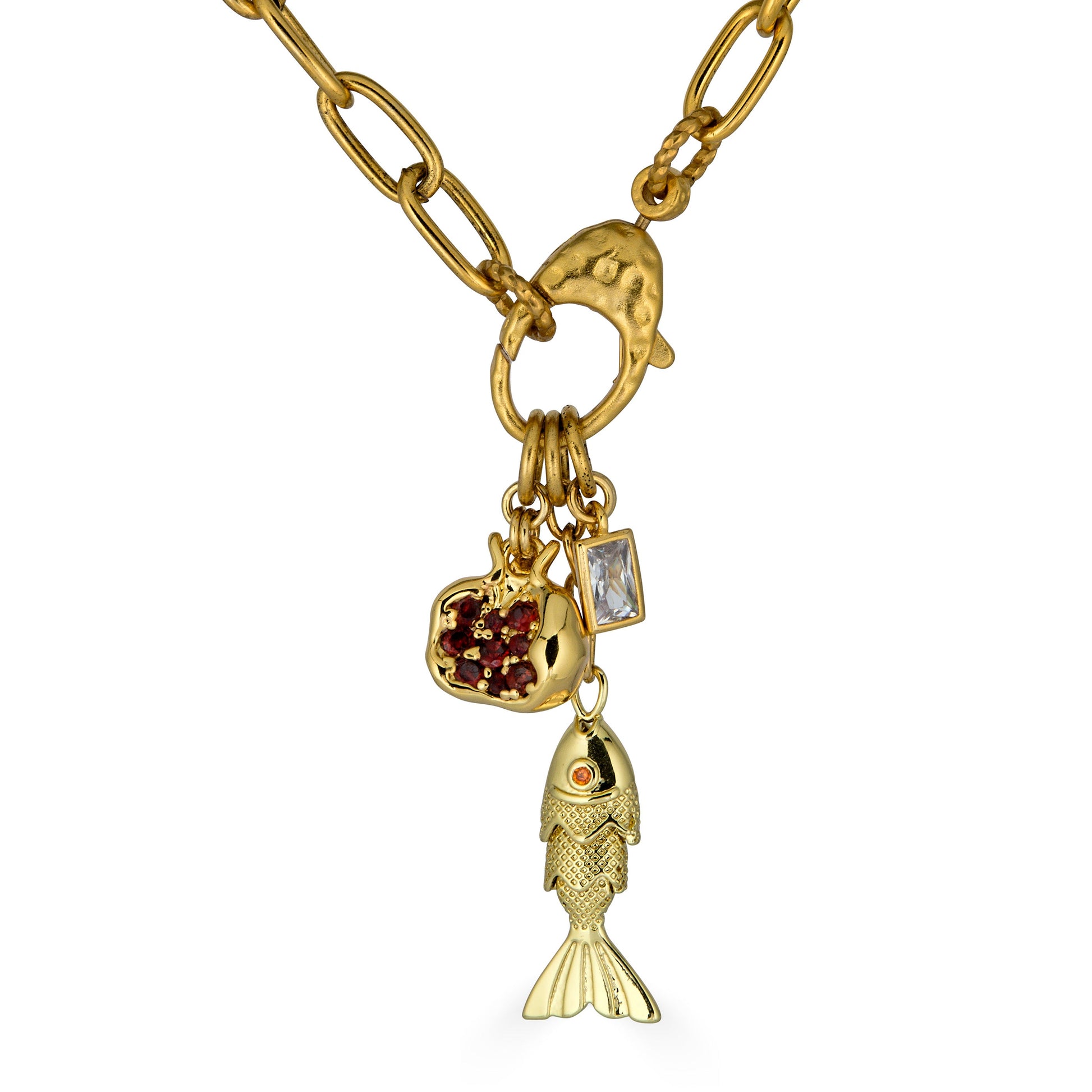 Gold chain necklace with fish charm, pomegranate charm, and crystal accents.