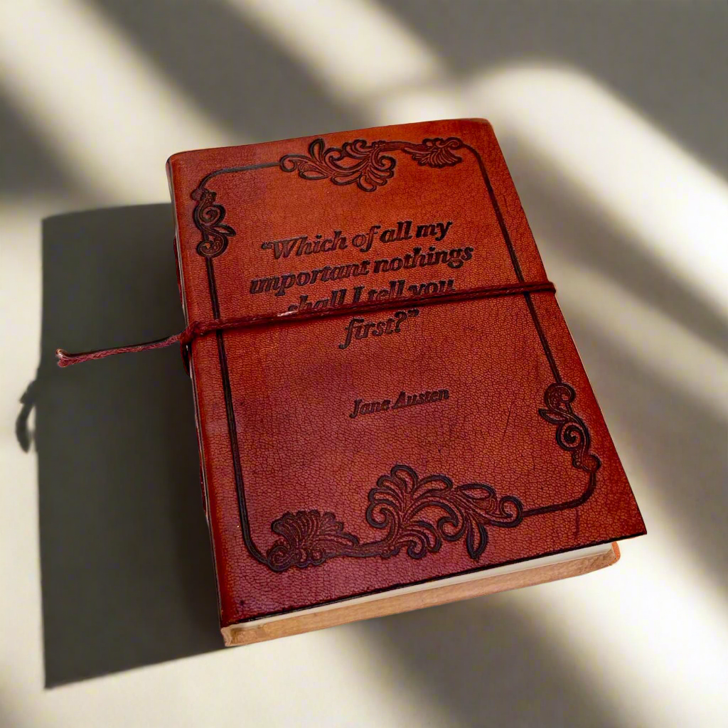 Earth-toned leather journal featuring embossed life quote – thoughtful companion for journaling and sketching on the go