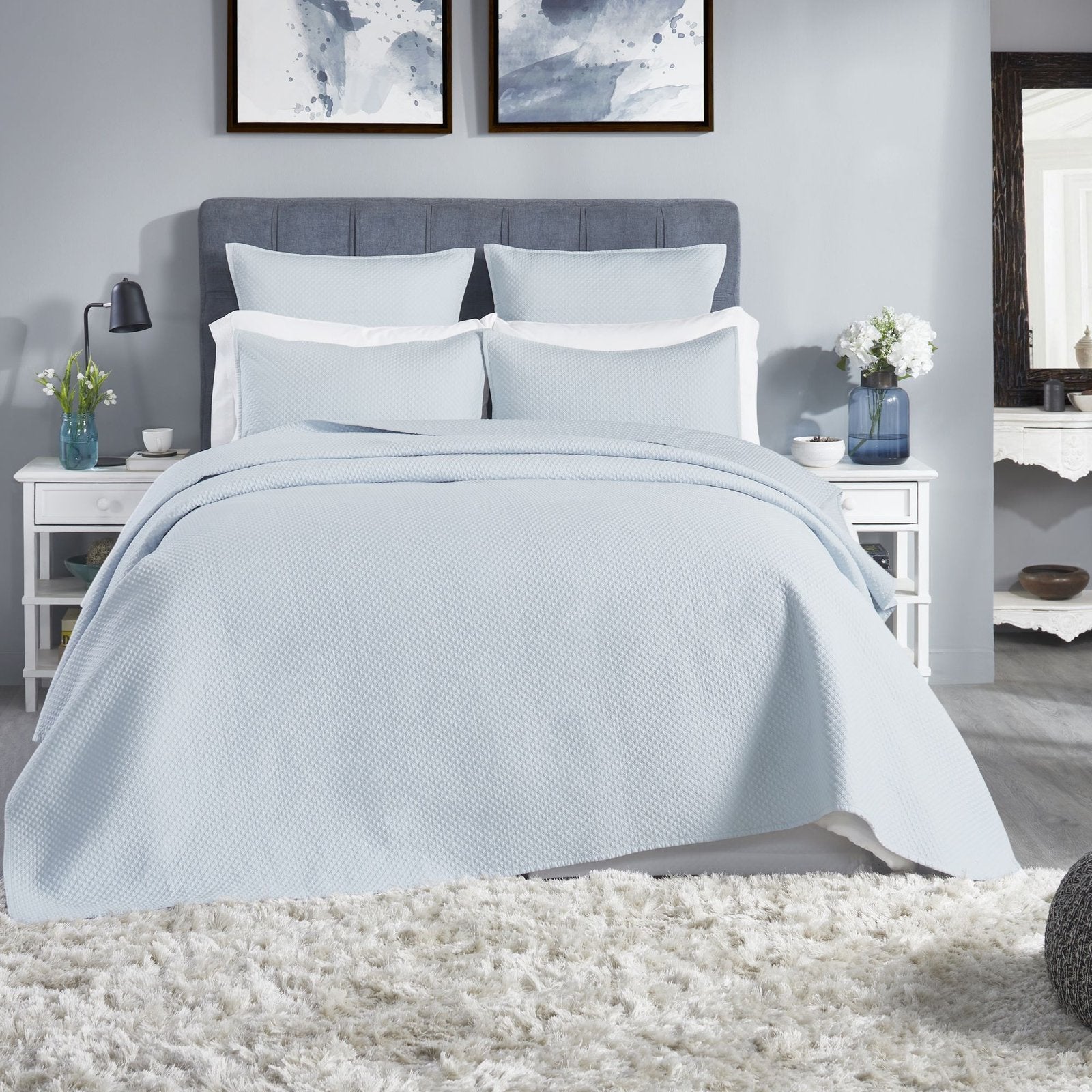 CL-251-9496_1|Light blue textured coverlet on a queen bed, creating a serene and calming atmosphere in a modern bedroom.