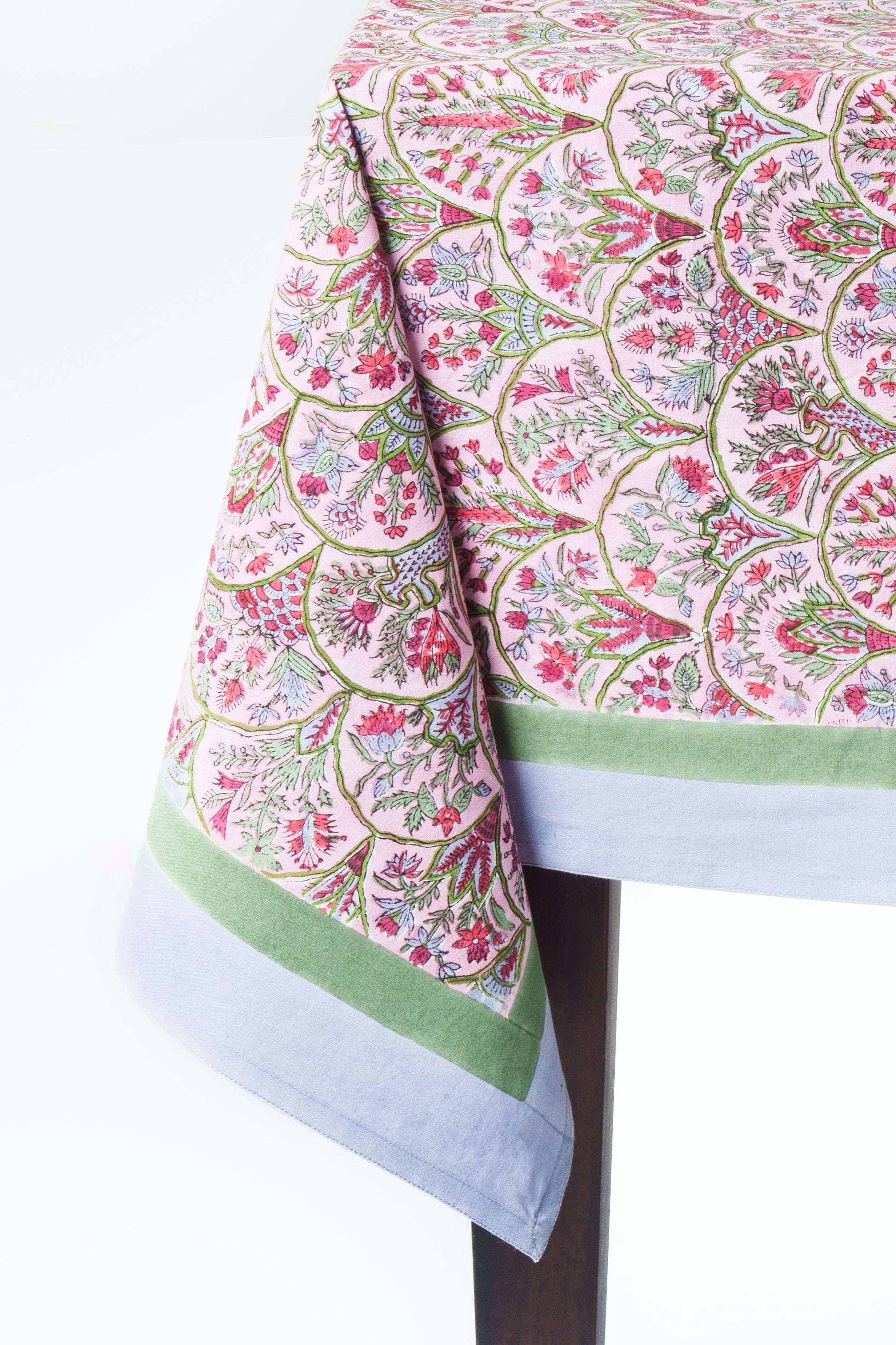 Pink arch blockprint tablecloth edge with green border detail