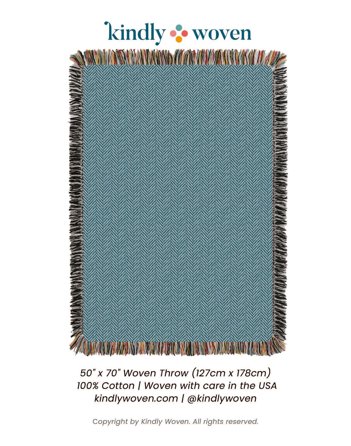 Full view of Henry Chambray blue herringbone reversible woven throw blanket with fringe