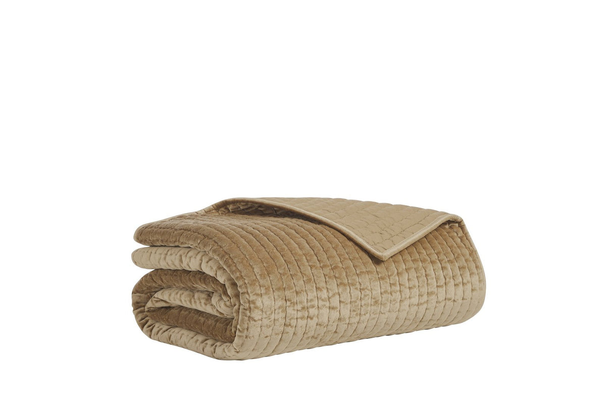 QT-362-11096_8|Folded camel velvet quilt featuring a rich textured striped design and smooth trim, offering cozy elegance for beds.