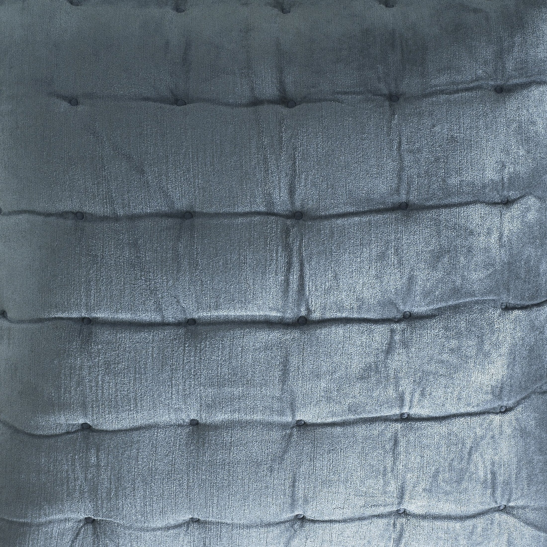 QT-310-9496_2|Close-up of a plush, quilted duvet or comforter in a rich, dark blue color, featuring button tufting and soft texture. Luxury bedding.