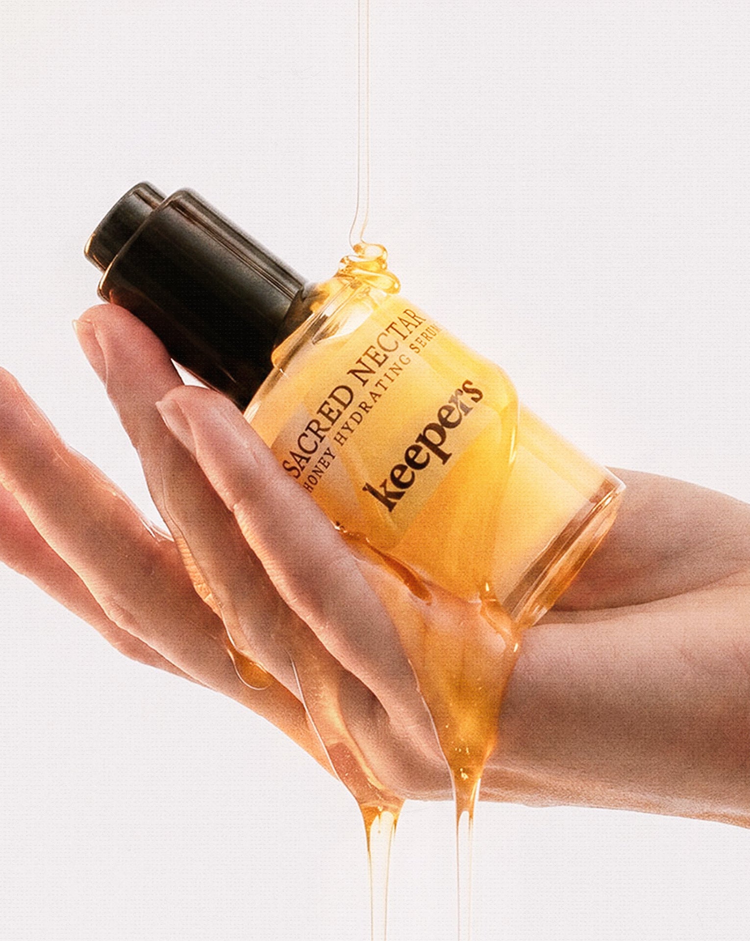 Sacred Nectar serum dropper bottle close-up