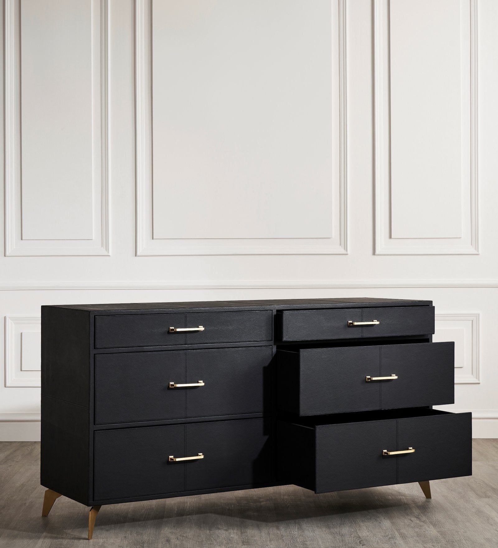 FN-5200-642033_5|Black leather six-drawer dresser with one drawer open, revealing spacious interior, complemented by gold bar handles.